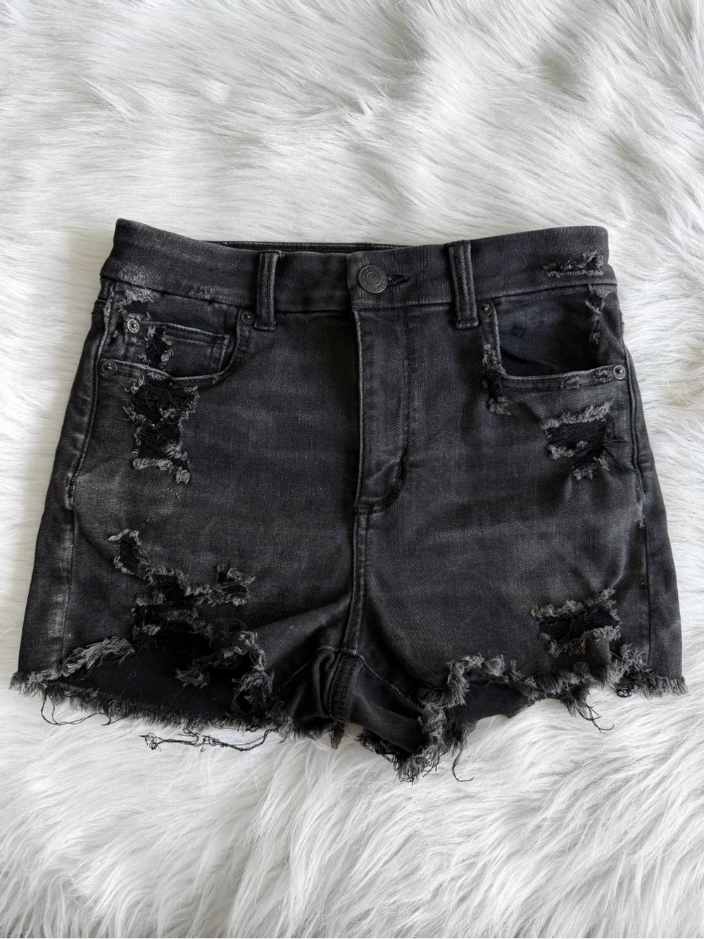 Black high waisted distressed shorts